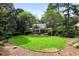 A lush lawn and patio create a private backyard oasis at 2231 Fairoaks Rd, Decatur, GA 30033