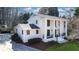 Beautiful white home with columns and a well-maintained lawn at 2231 Fairoaks Rd, Decatur, GA 30033