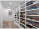 Hallway featuring floor-to-ceiling bookshelves filled with books at 2231 Fairoaks Rd, Decatur, GA 30033