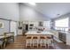 Bright, modern kitchen with white cabinets, a large island and stainless steel appliances at 4972 Arbor View Nw Pkwy, Acworth, GA 30101