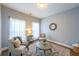 Cozy living room featuring large windows, comfortable chairs and natural light at 4972 Arbor View Nw Pkwy, Acworth, GA 30101