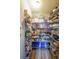 Walk-in pantry featuring organized shelving and ample storage space for food and kitchen supplies at 4972 Arbor View Nw Pkwy, Acworth, GA 30101