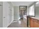 Bathroom featuring dual vanities, a glass-enclosed shower and a soaking tub at 772 Crescent Cir, Canton, GA 30115