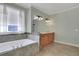 Spacious bathroom with tub, and double sink vanity at 772 Crescent Cir, Canton, GA 30115