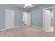 Bedroom with light blue walls, carpet, and white trim at 772 Crescent Cir, Canton, GA 30115