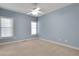 Bedroom with two windows, carpet and neutral walls at 772 Crescent Cir, Canton, GA 30115