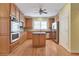 Open concept kitchen with stainless steel appliances and granite countertops at 772 Crescent Cir, Canton, GA 30115