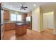 Traditional kitchen with stainless steel appliances, wood cabinets and hardwood floors at 772 Crescent Cir, Canton, GA 30115