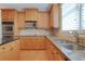 Kitchen featuring double sinks, stainless steel appliances, and tile backsplash at 772 Crescent Cir, Canton, GA 30115