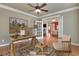 Staged home office with natural lighting, hardwood floors and french doors at 772 Crescent Cir, Canton, GA 30115