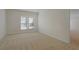 Bright bedroom features neutral carpet, fresh paint and a view of the hallway at 4669 Prater Se Way, Smyrna, GA 30080