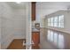 Walk-in pantry with wire shelving and a view of the living room with a fireplace at 4669 Prater Se Way, Smyrna, GA 30080