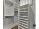 A closet with custom shelving and ample storage space at 5975 P W A Dr, Cumming, GA 30041