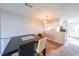 Neutral dining area with a view into the kitchen at 6657 Witherington Ct, Norcross, GA 30093