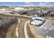 Aerial view of community featuring a pool, walking trails, and surrounding shops at 6785 Pippin Walk, Alpharetta, GA 30005