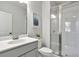 Modern bathroom with sleek vanity, glass-enclosed shower, and contemporary fixtures at 6785 Pippin Walk, Alpharetta, GA 30005