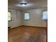 Bedroom with hardwood floors and natural light at 1902 Godby Rd, Atlanta, GA 30349