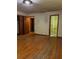 Spacious bedroom with hardwood floors and connecting bath at 1902 Godby Rd, Atlanta, GA 30349
