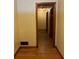 Hallway featuring wood floors and neutral wall paint at 1902 Godby Rd, Atlanta, GA 30349