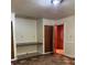 Inviting room with built-in desk and wood flooring at 1902 Godby Rd, Atlanta, GA 30349