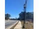 Street view with light post on a sunny day with a blue sky and scattered clouds at 1902 Godby Rd, Atlanta, GA 30349