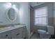 Bathroom boasts toilet, sink, and standing shower at 2634 Arrowood Dr, Atlanta, GA 30344