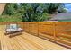 Back deck featuring a bench, small table, and wooden surround at 203 Sunset Nw Ave, Atlanta, GA 30314