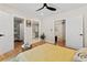 Bright bedroom features hardwood floors, closets, and ensuite bathroom at 203 Sunset Nw Ave, Atlanta, GA 30314