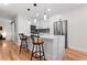 Modern kitchen with sleek countertops, stainless steel appliances, and pendant lighting at 203 Sunset Nw Ave, Atlanta, GA 30314