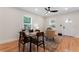 Inviting living area with hardwood floors, dining table, and ample natural light at 203 Sunset Nw Ave, Atlanta, GA 30314