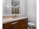 Well-lit bathroom with vanity and framed mirror at 3641 Broughton Se Cir, Atlanta, GA 30339