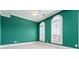 Bedroom with green walls, carpet floors, white trim and large windows for natural light at 3641 Broughton Se Cir, Atlanta, GA 30339