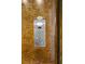 Close-up of elevator panel featuring wood grain and button interface at 3641 Broughton Se Cir, Atlanta, GA 30339