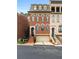 Beautiful brick townhome with garage and landscaped front entrance at 3641 Broughton Se Cir, Atlanta, GA 30339