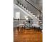 Inviting foyer showcasing a staircase with iron spindles and comfortable seating at 3641 Broughton Se Cir, Atlanta, GA 30339