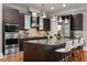 Modern kitchen with stainless steel appliances, granite countertops, and a large island at 3641 Broughton Se Cir, Atlanta, GA 30339