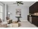 Living room with gray walls, carpet floors, mini bar and natural light at 3641 Broughton Se Cir, Atlanta, GA 30339