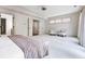 Spacious main bedroom with cozy seating area and access to ensuite bath at 3641 Broughton Se Cir, Atlanta, GA 30339