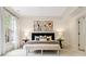 Serene main bedroom featuring tray ceiling, neutral tones, and chic decor at 3641 Broughton Se Cir, Atlanta, GA 30339