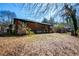 The backyard of the house, with brickwork and a fence line at 228 W Simon Nw Ter, Atlanta, GA 30318