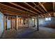 Spacious unfinished basement with visible ceiling and a window providing natural light at 228 W Simon Nw Ter, Atlanta, GA 30318