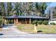 Beautiful single-story brick home with a covered carport and a well-maintained yard at 228 W Simon Nw Ter, Atlanta, GA 30318