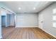 Updated living room with wood-look floors, fresh paint and modern windows at 228 W Simon Nw Ter, Atlanta, GA 30318
