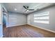 Bright living room features wood-look floors, modern lighting, and updated windows at 228 W Simon Nw Ter, Atlanta, GA 30318