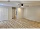 Spacious bedroom with vinyl wood floors, a ceiling fan, and a double door closet at , Decatur, GA 30032