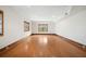 Bonus room with hardwood floors, recessed lighting, and natural light from the windows at 1585 Lazy River Ln, Sandy Springs, GA 30350