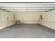 Spacious two car garage with epoxy flooring and bright lighting, perfect for storage or a workshop at 1585 Lazy River Ln, Sandy Springs, GA 30350