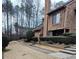 Exterior view of the home, showing natural surroundings at 43 Willowick Ct, Stonecrest, GA 30038