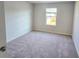 Clean, carpeted bedroom with neutral colors, perfect for rest and relaxation at 2389 Brown Dove Way (5), Grayson, GA 30017