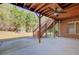 Covered patio area leading to a gazebo in the backyard at 589 Cook Dr, Ellenwood, GA 30294
